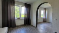 Dreifamilienhaus! Großer Garten und Wintergarten, Balkon, Loggia, Stellplätze, am Ortsrand in Rhade - Zimmer der EG Wohnung