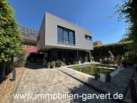 Außergewöhnlich wohnen! Extravagantes Wohnhaus mit Garten und Garage, zentrale Lage in Südlohn, 46354 Südlohn, Einfamilienhaus